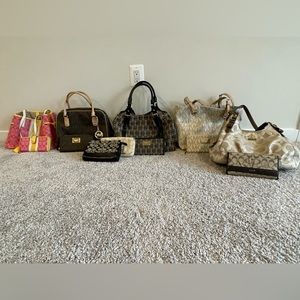 Purses and matching wallets. Coach and MK